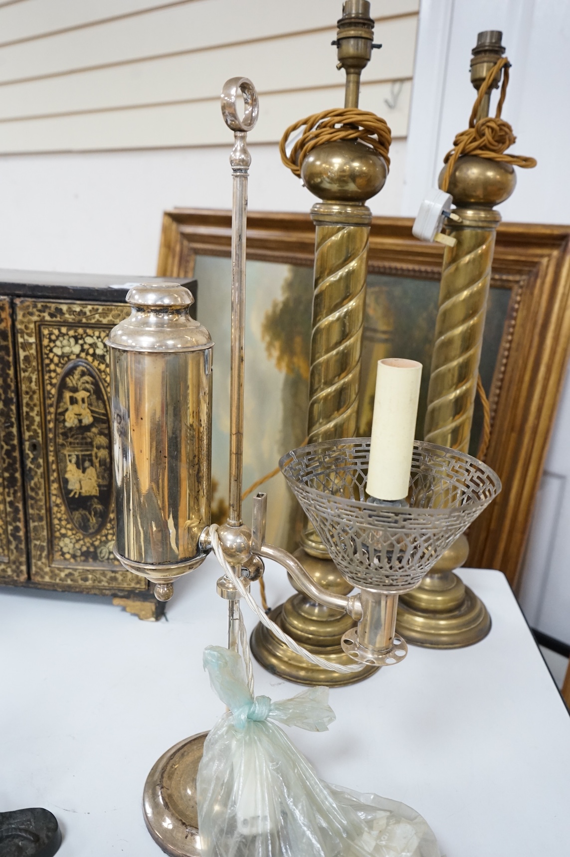 A pair of tall brass fluted column table lamps and arise and fall desk lamp, largest each overall 64cm high